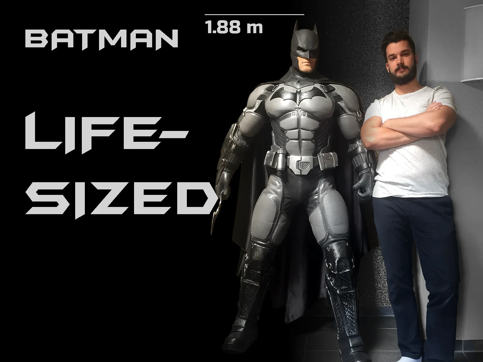 Completed 1.88 metre life-size Batman statue beside its creator